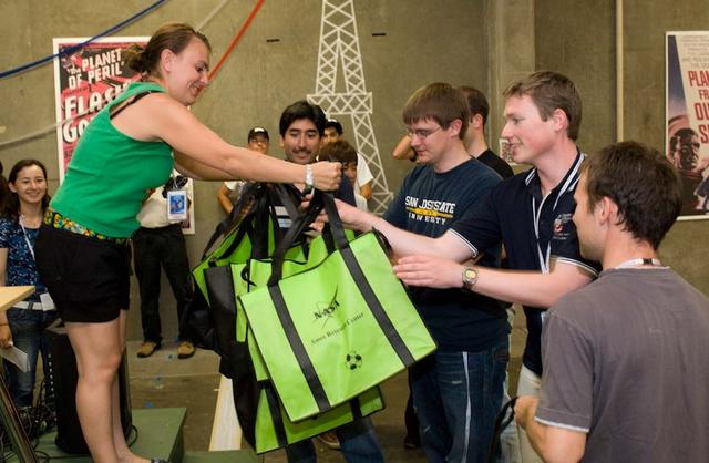 International Space University (ISU - 2009) students participated in a Robotic Competition at NASA'A Ames Research Center, Moffett Field, Calif. This panel featured astronauts from four different space agencies with different areas of expertice and diverse perspectives. Left to Right: Luisa Fernanda Zambrano Marin, ISU SSP09 external relaations coordinator awards the winning Robotic Competition team members and ISU SSP09 students Felipe Sauced, Kenneth Ashford, Rogan Shimmin and Guy De Carufel.