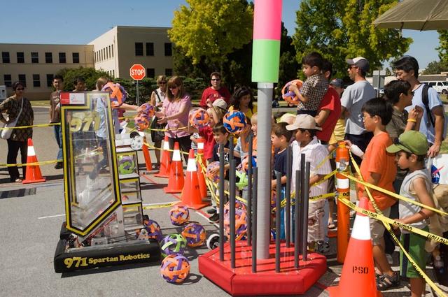 MoonFest: From Apollo to LCROSS and Beyond public event at NASA'S Ames Researc Center, Moffett Field, Calif. The day included scientific talks, model rocket launches on the flight line, musical performances, family-friendly activities and more. Robot '971 Spartan Robotics' from the FIRST Robotic competition, demo their abilities.