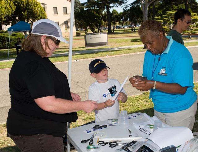 MoonFest: From Apollo to LCROSS and Beyond public event at NASA'S Ames Researc Center, Moffett Field, Calif. The day included scientific talks, model rocket launches on the flight line, musical performances, family-friendly activities and more. Building a rocket from scratch.