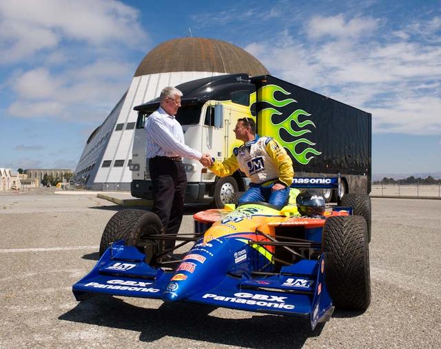 NASA Research Park (NRP) Timothy Collins, President and Chairman, KleenSpeed Technologies, Inc. and Captain Andrew Butte, rescue helicopter pilot and former Army Aviator, with Butte's 1999 SWIFT. ChampCar  Butte has given his racecar to KleenSpeed for conversion to electric.