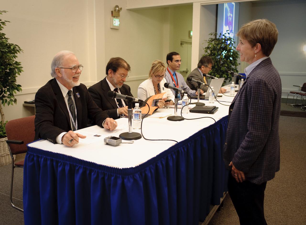 International Space University (ISU) and Singularity University (SU) Emerging Space Nations Panel held at NASA's Ames Research Center 2009 host site. Angie Bukley, ISU SSP09 program director, speaks with the panel moderator, Ray Williamson, ISU SSP09 distinguished lecturer and executive director of the Secure World Foundation, Superior, Colo., before the discussion begins.