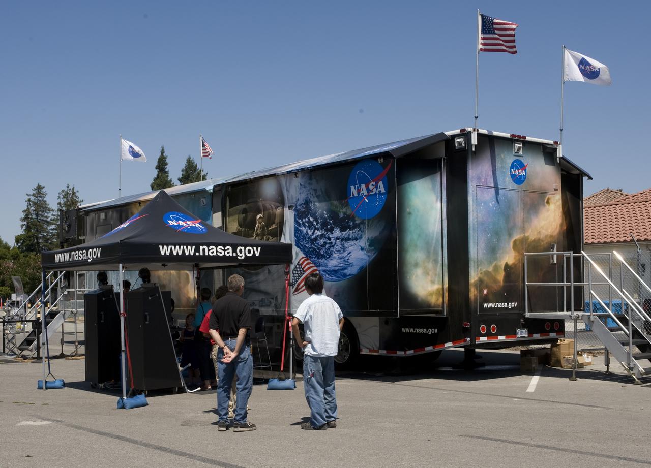 The NASA Exploration Experience makes a stop at NASA Ames Research Center, Moffett Field, Calif. The traveling exhibit is an interactive experience intended to give visitors a vivid glimpse into the nation's ambitious future in space. It is sponsored by NASA's Exploration Systems Misssion Directorate in Washington D.C. and supported by NASA's Aerospace Educaiton Services Project.