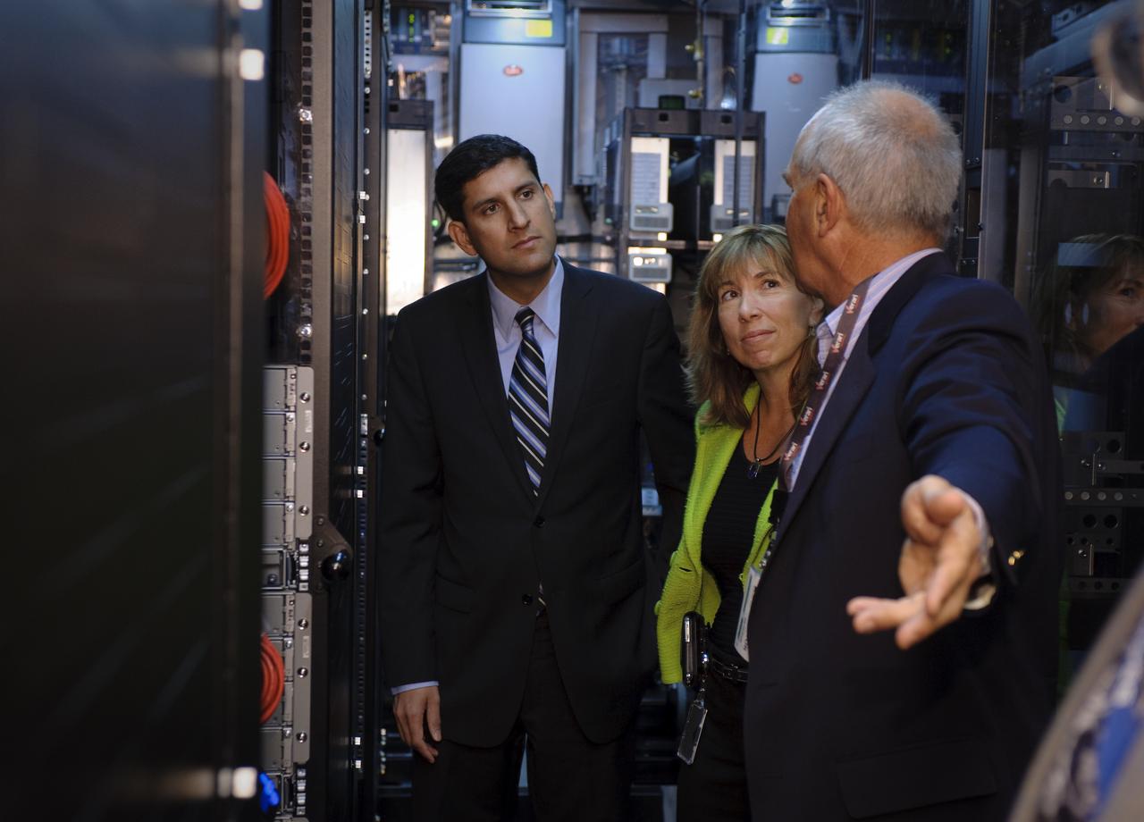 Obama Administration launches Cloud Computing Initiative at Ames Research Center. Vivek Kundra, White House Chief Federal Information Officer (left) and Lori Garver, NASA Deputy Administrator (ctr) get a tour of the NASA Nebula Infrastructure with Bobby Cates (right).