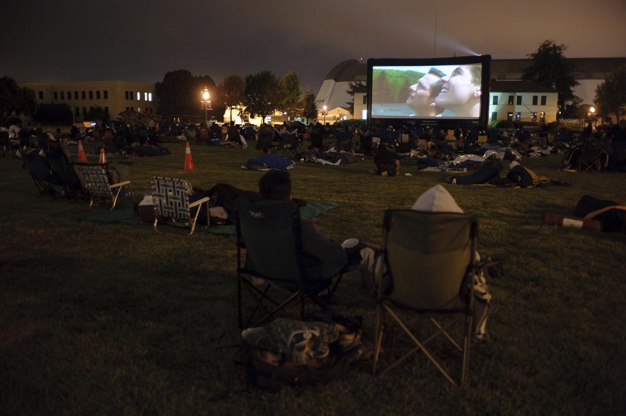 LCROSS Impact Night: Public invited to all night event are watching the mission unfold from a large screen on Shenandoah Parade Grounds at NASA Ames Research Center, Moffett Field Calif. while listening to the music of Kenji Williams on violin.