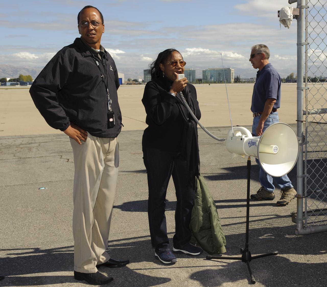 Ames 70_year picture day on Flight line. Sheila Johnson orginazing the line up.