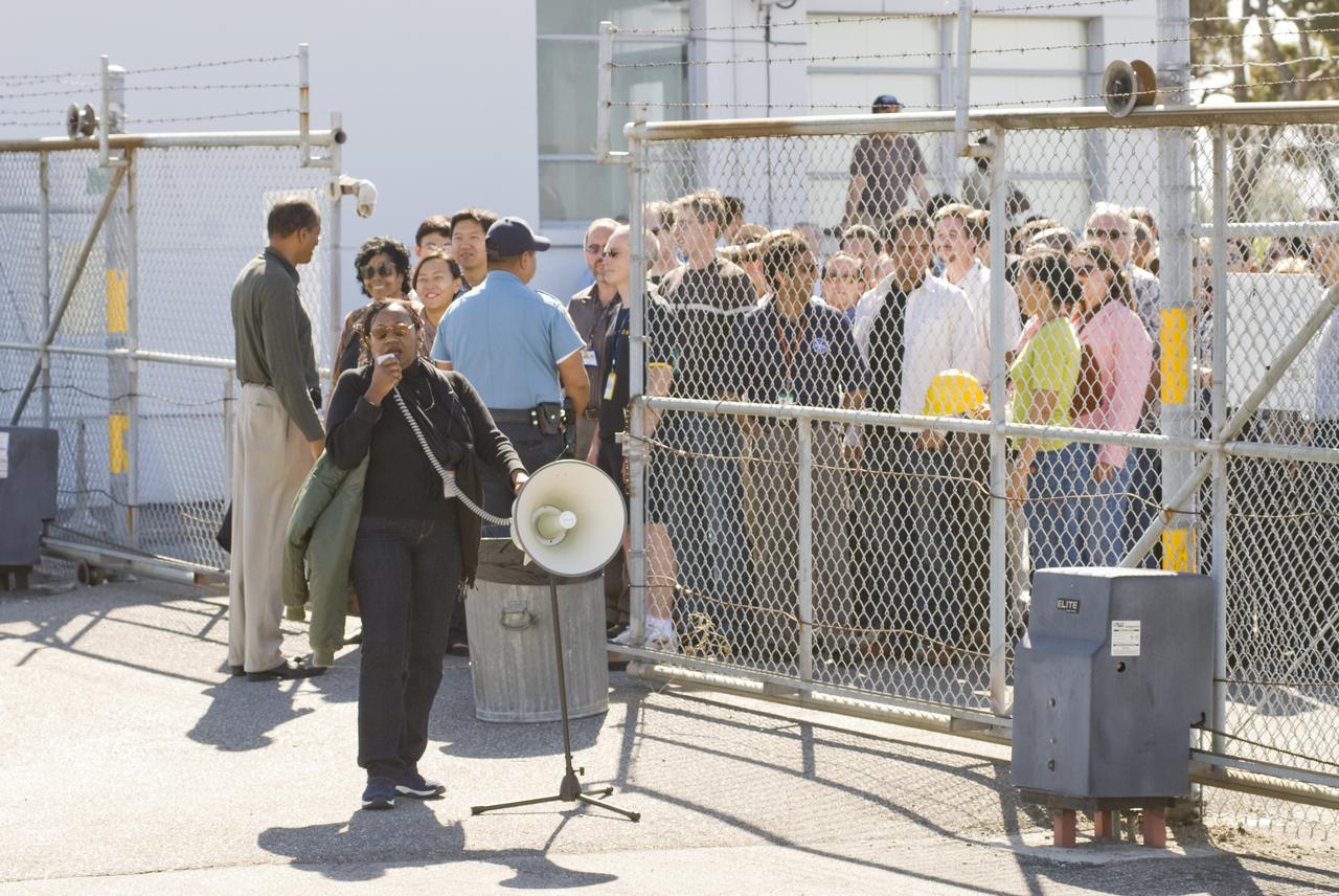 Ames 70_year picture day on Flight line. Sheila Johnson orginazing the line up.