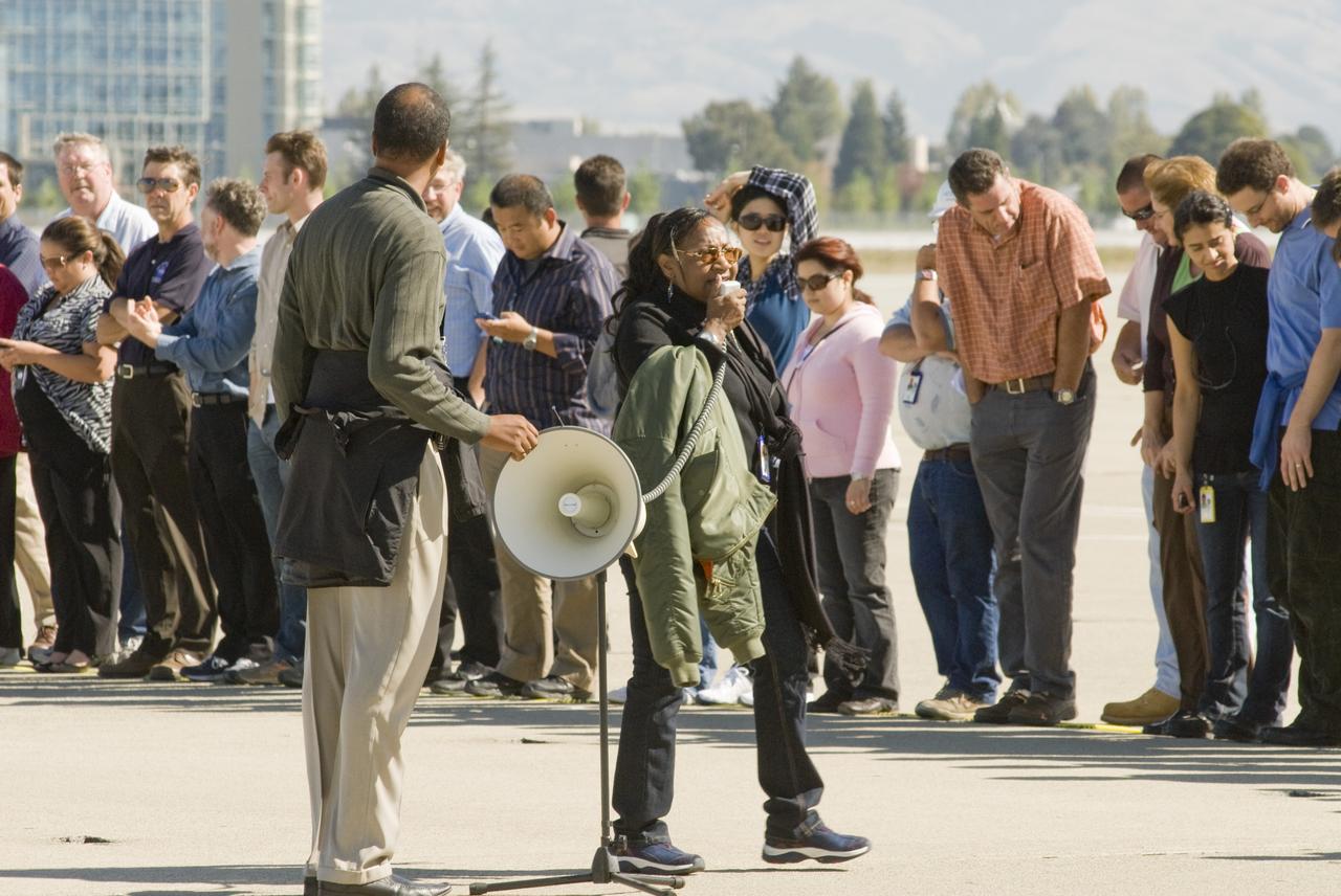 Ames 70_year picture day on Flight line. Sheila Johnson orginazing the line up.