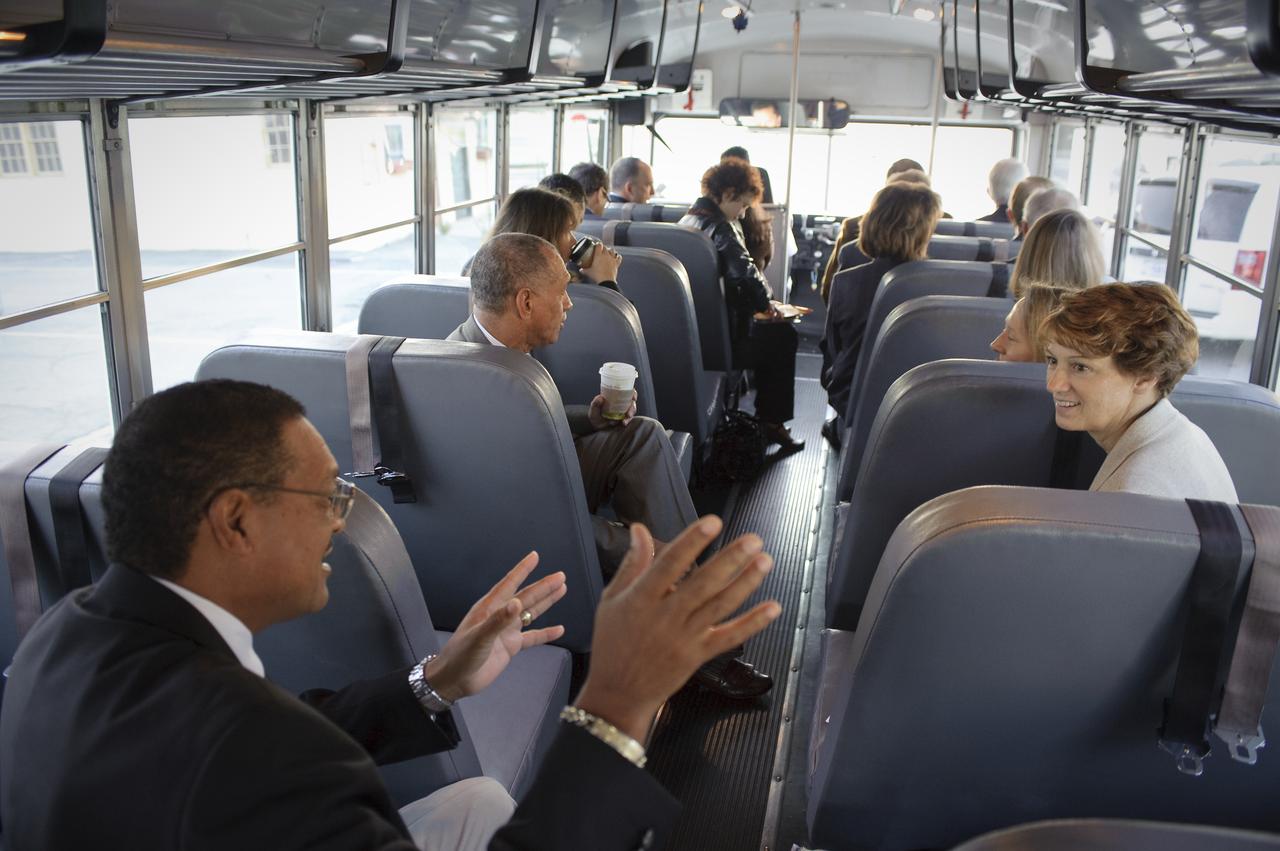 NASA Advisory Council Meeting at NASA Ames Research Center NRP Conference Center. on the tour bus Lew Braxton III in foreground taking with Eilene Collins from council.