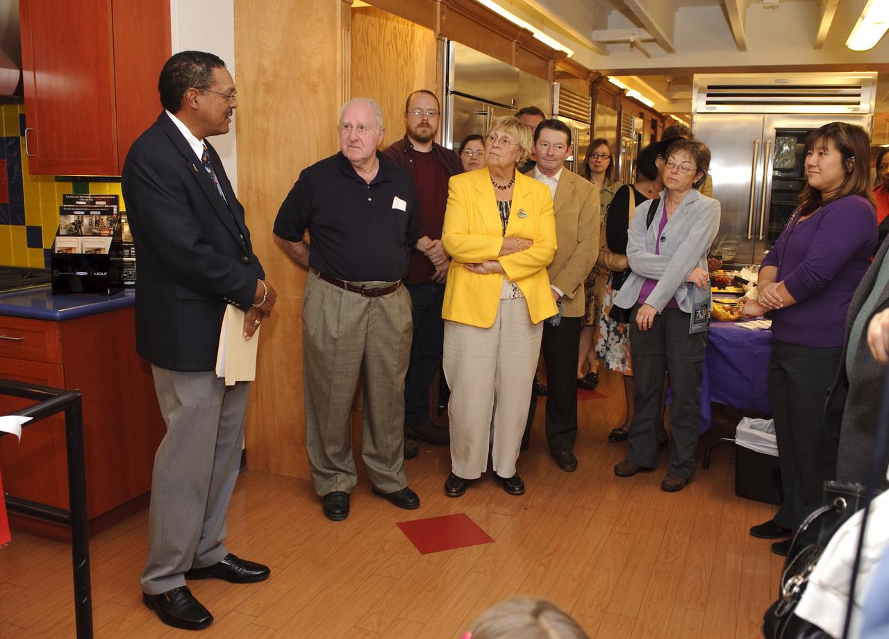 Ames 70 Year Anniversary Exhibit in downtown Mountain View, California. Grand Opening at Meyer Appliance, Castro Street. Lewis Braxton III, Ames Deputy Center Director opens exhibit.