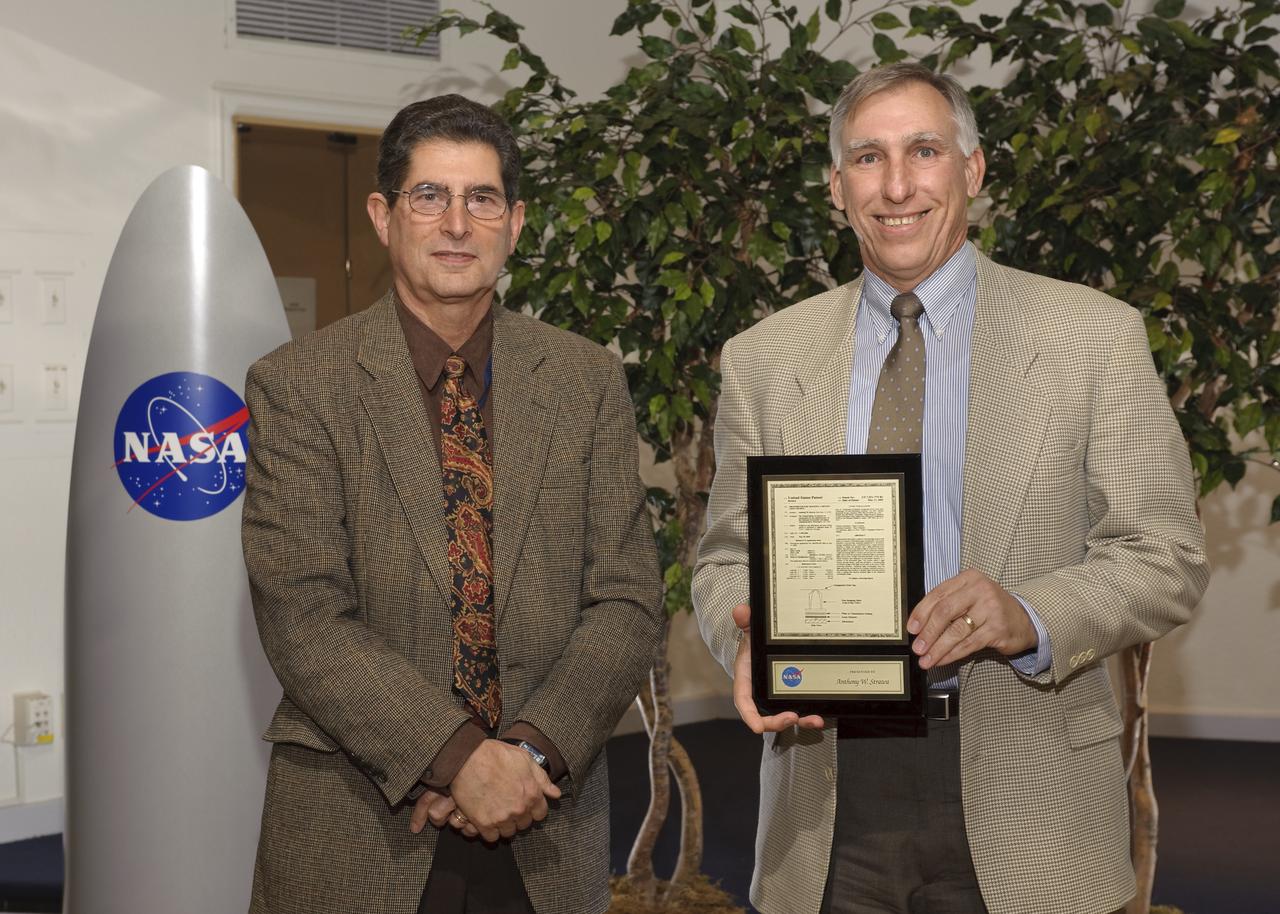 2009 Awards Ceremony; 2008 Government Invention of the Year Award, 2009 Software of the Year Award sponsored by Ames Innovative Partnerships Program Office. Patent Awards, Steve Zornetzer, Associate Director Ames Research Center presenting: Anthony Strawa for Photometer for Tracking a Moving Light Source.