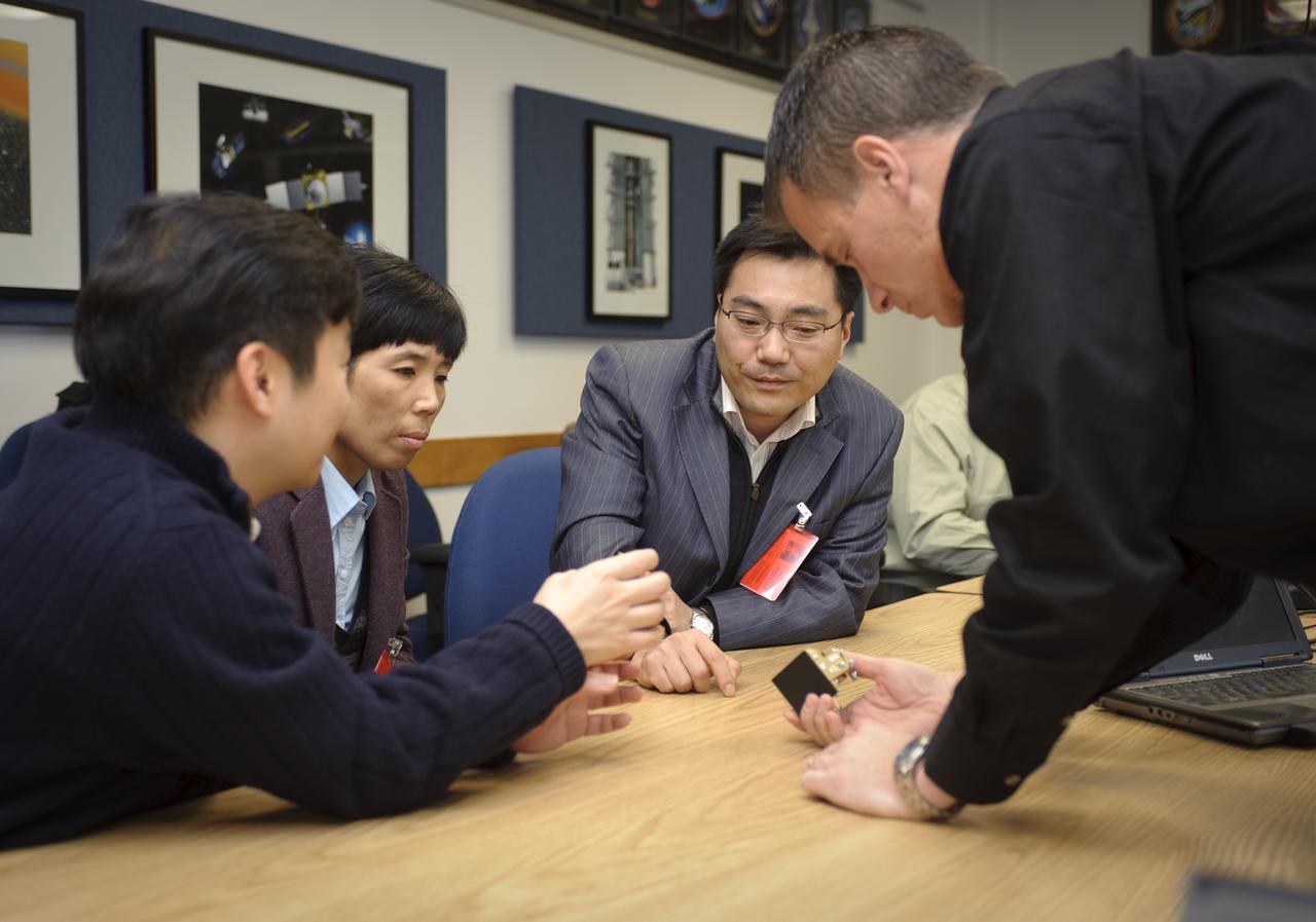 Korean High Level Delegation Visit Ames Certer Director and various Senior staff: Dan Andrews give presentation about LCROSS/LRO to Seorium Lee, Senior Researcher, International Relations Korea Aerospace Research Institute, Soon-Duk Bae, Deputy Director, Big Science Policy Division, Ministry of Educaiton, Science Technology, Young-Mok Hyun, Deputy Director, Space Development Division, Ministry of Educaiton, Science Technology, Seorium Lee, Senior Researcher, International Relations Korea Aerospace Research Institute.