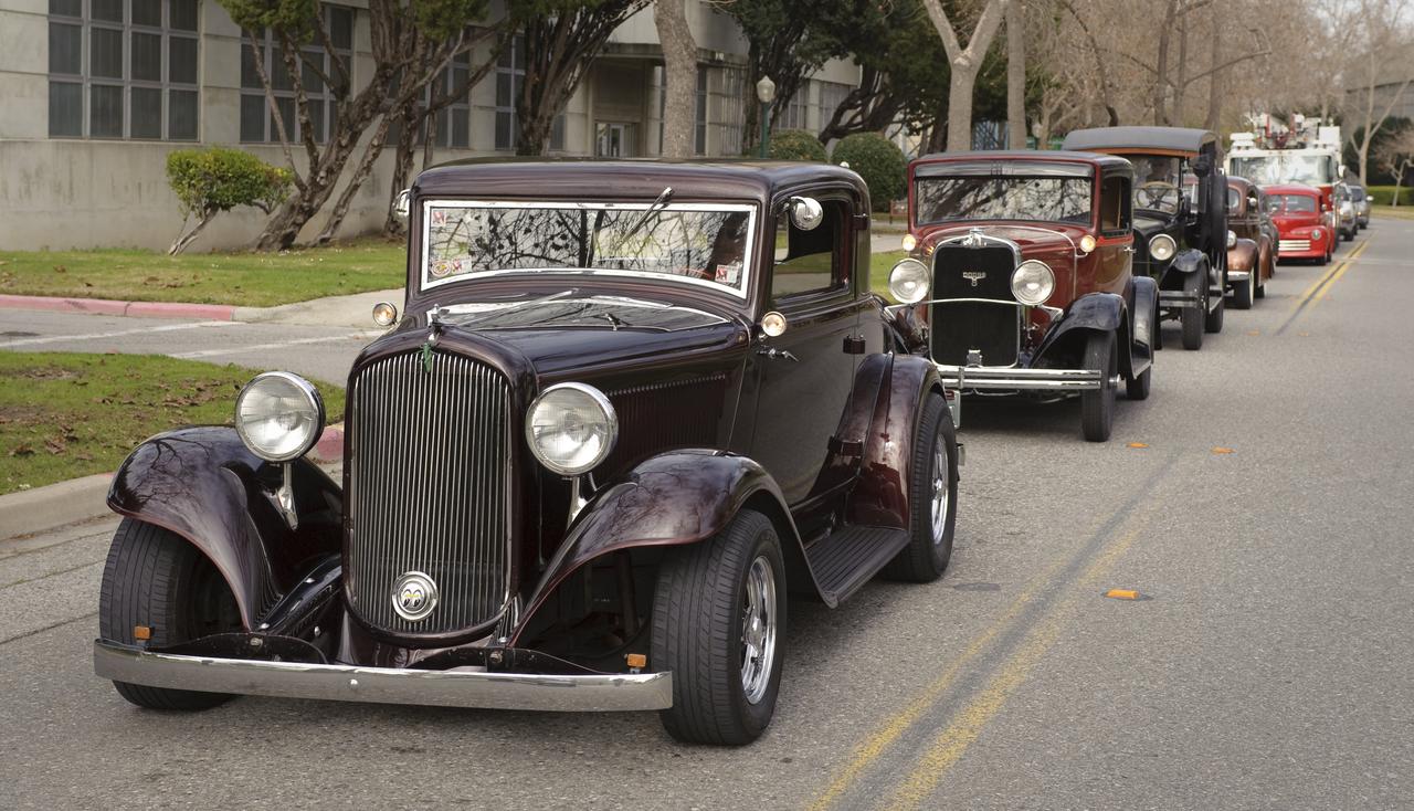 Ames 70th Anniversary Turn Back the Clock Day with antique Class Cars and Classic Car parade around the center.