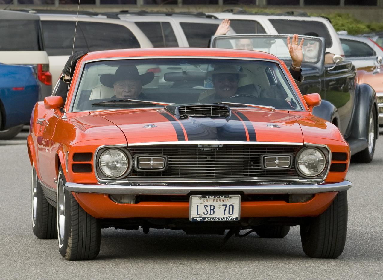 Ames 70th Anniversary Turn Back the Clock Day with antique Class Cars and Classic Car parade around the center.  Lewis Braxton III, Ames Deputy Center Director and Jack Boyd, Ames Historian lead the parade in Lew's Mustang.
