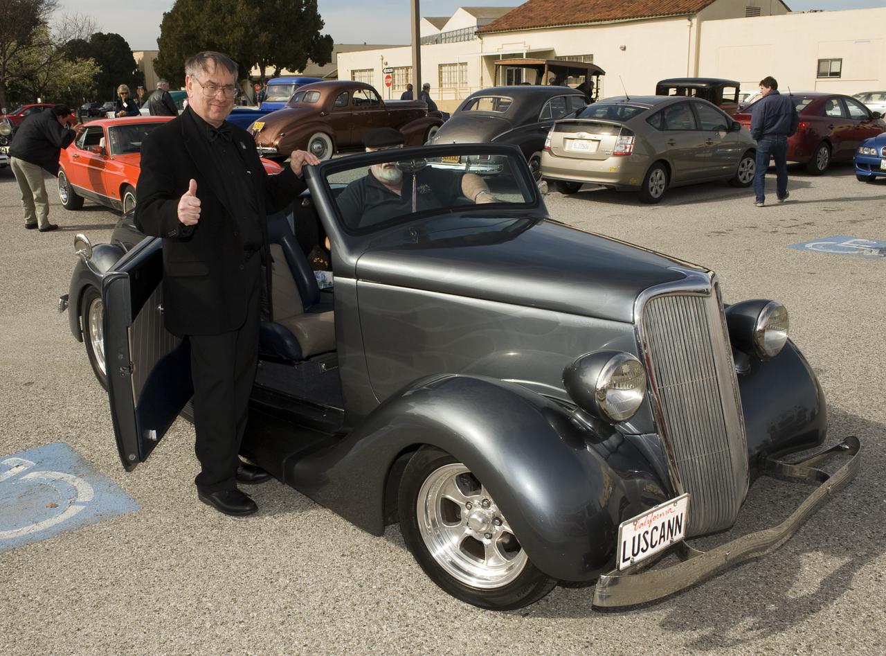 Ames 70th Anniversary Turn Back the Clock Day with antique Class Cars and Classic Car parade around the center. S. Pete Worden, Ames Center Director hopes onboard for a ride in the parade.