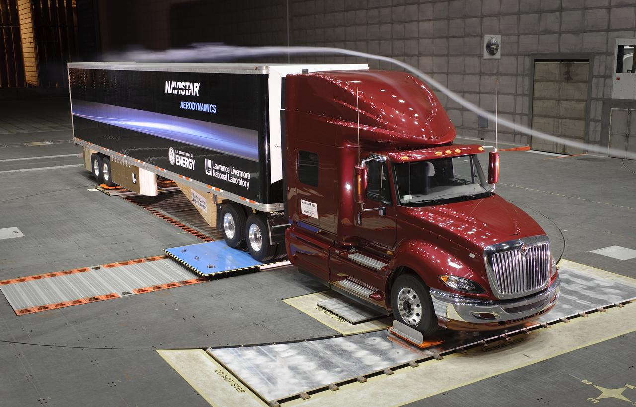 Lawrence Livermore National Labs (LLNL), Navistar and the Department of Energy conduct tests in the NASA Ames National Full-scale Aerodynamic Complex 80x120_foot wind tunnel. The LLNL project is aimed at aerodynamic truck and trailer devices that can reduce fuel consumption at highway speed by 10 percent. Smoke test demo.