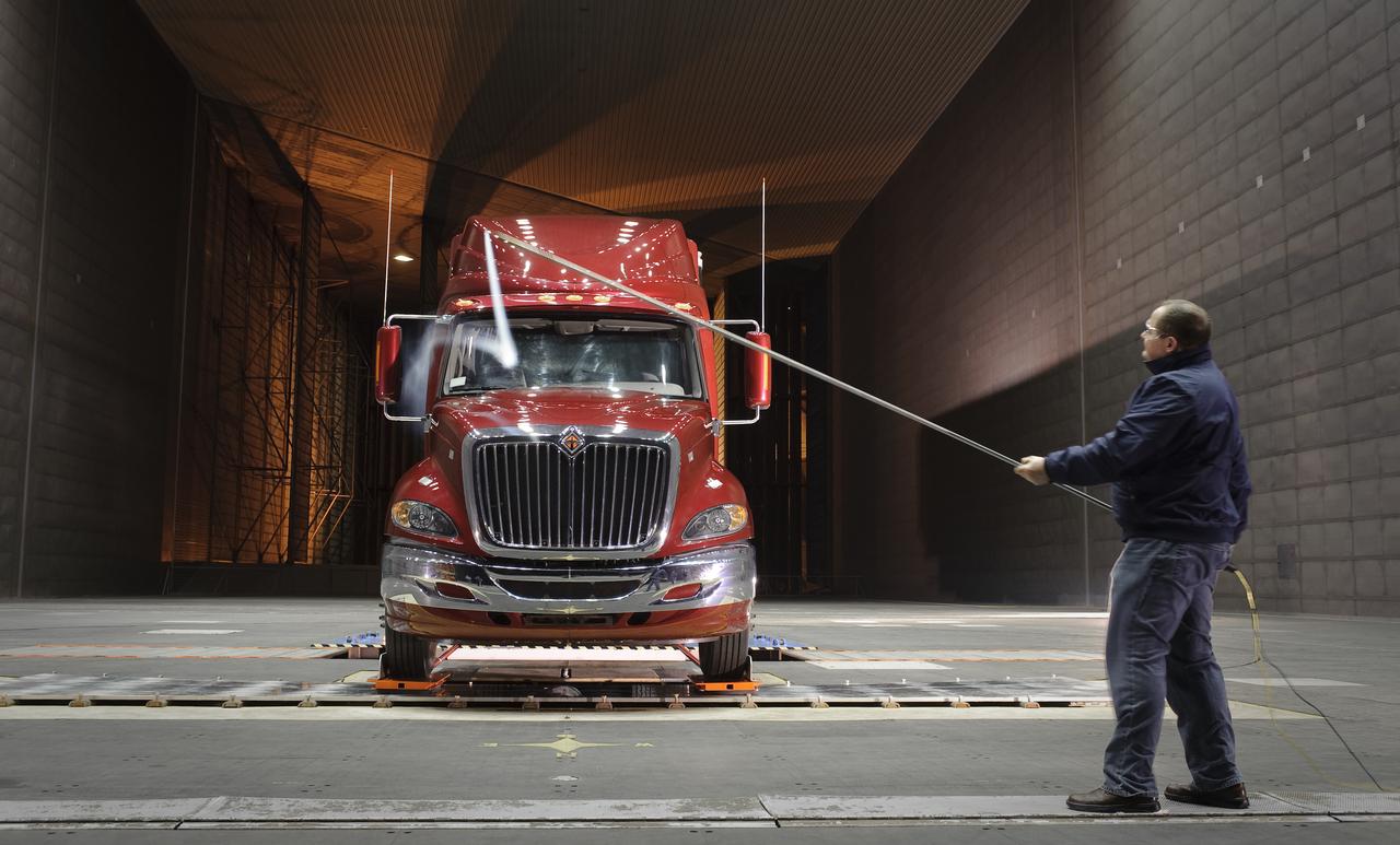 Lawrence Livermore National Labs (LLNL), Navistar and the Department of Energy conduct tests in the NASA Ames National Full-scale Aerodynamic Complex 80x120_foot wind tunnel. The LLNL project is aimed at aerodynamic truck and trailer devices that can reduce fuel consumption at highway speed by 10 percent. Smoke test demo with Ron Schoon, Navistar.