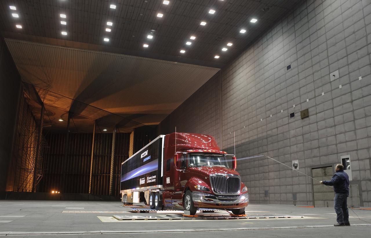 Lawrence Livermore National Labs (LLNL), Navistar and the Department of Energy conduct tests in the NASA Ames National Full-scale Aerodynamic Complex 80x120_foot wind tunnel. The LLNL project is aimed at aerodynamic truck and trailer devices that can reduce fuel consumption at highway speed by 10 percent. Smoke test demo with Ron Schoon, Navistar.