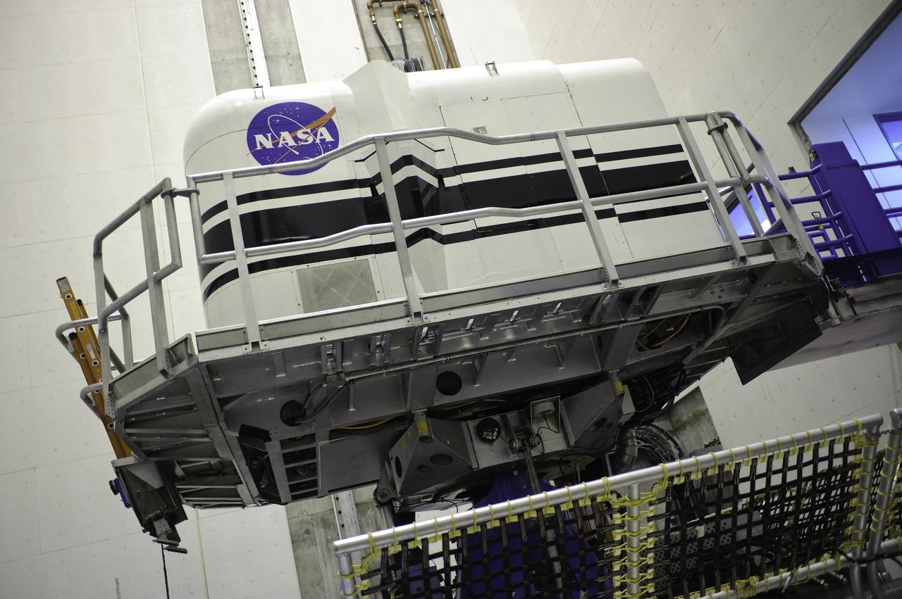 Vertical Motion Simulator (VMS) interior with Shuttle Cab (S-cab) mounted in facility.