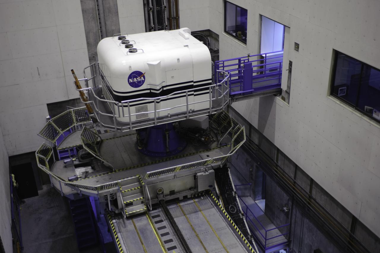 Vertical Motion Simulator (VMS) interior with Shuttle Cab (S-cab) mounted in facility.