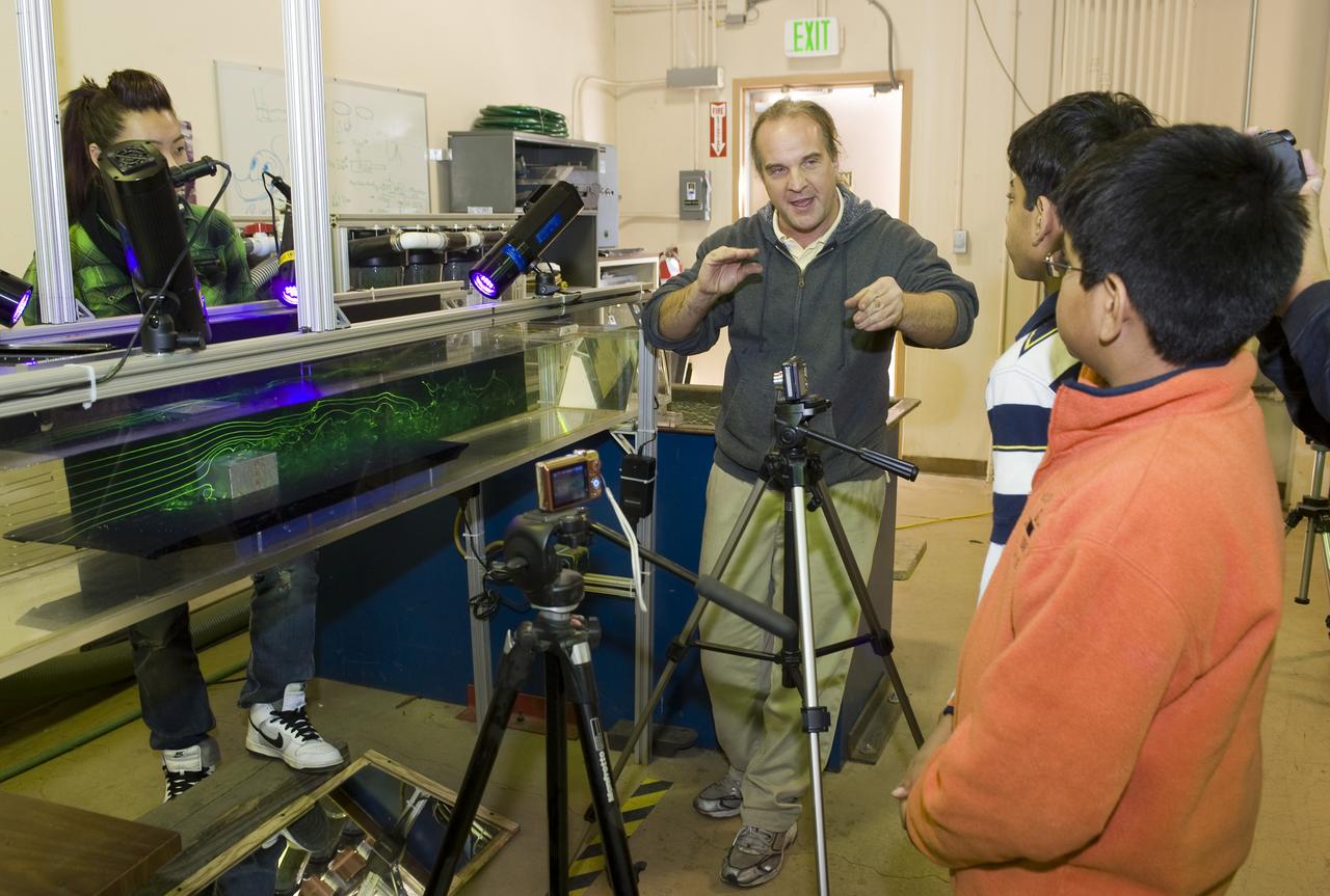 Students, Ajay Ramesh and Prithvi Aiyaswamy  in 7th grade, Chaboya Middle School, San Jose, have entered the Intel Inernational Science Fair (May 2010) They are here at the Ames Research center to test the drag of race cars in the Fluid Mechanics Lab (FML) with the guidance of Kurt Long of the Experimental Aero-Physics Branch.