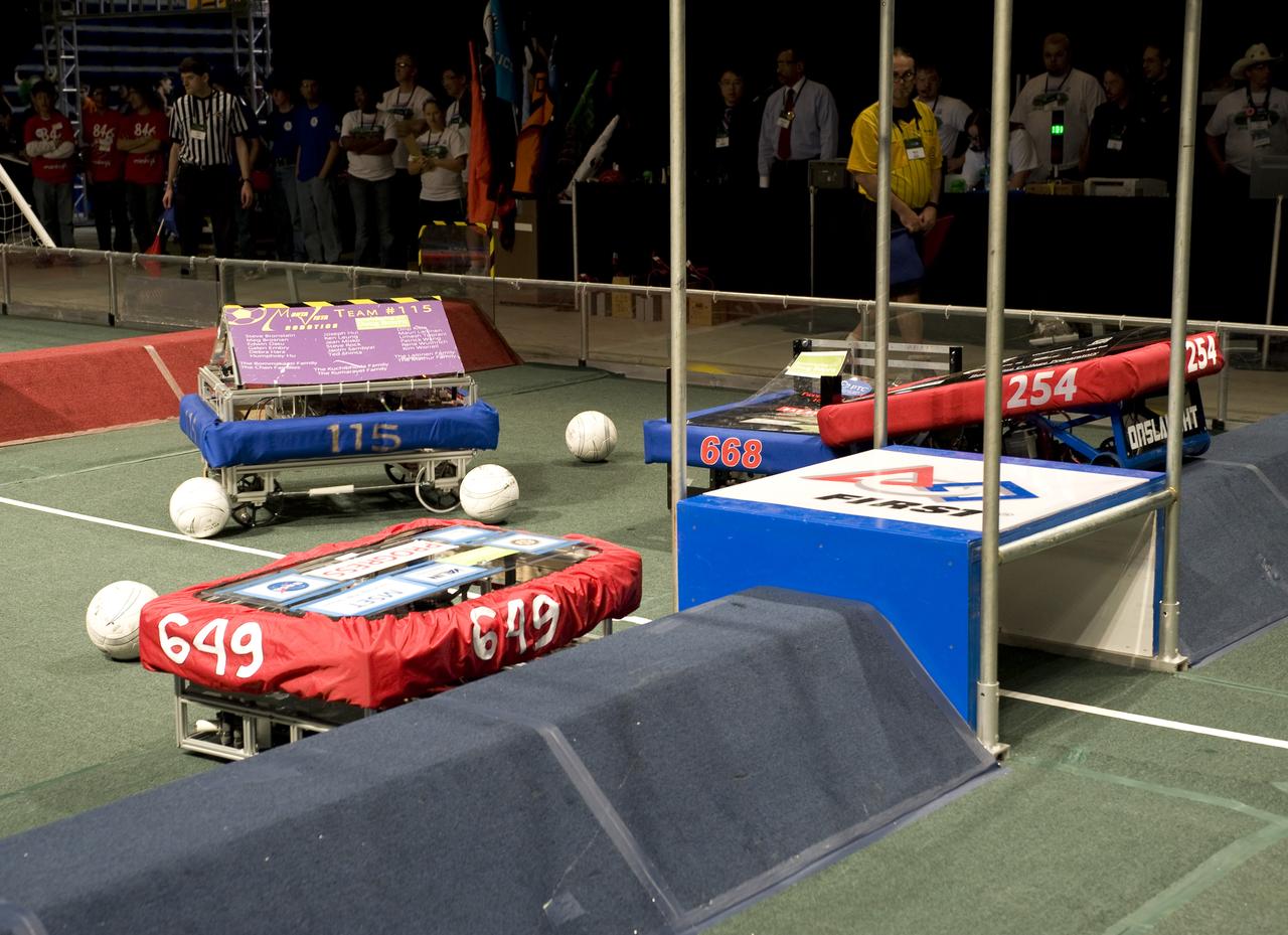 For Inspiration and Recognition of Science and Technology; FIRST Robotics Competition 2010 Silicon Valley Regional held at San Jose State University, San Jose, California  team 115, 668,254 and 649 do battle during a match