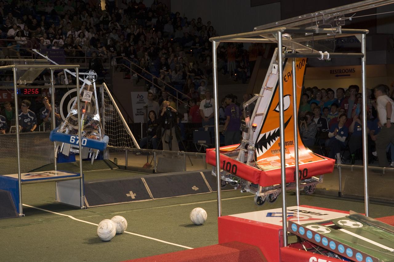 For Inspiration and Recognition of Science and Technology; FIRST Robotics Competition 2010 Silicon Valley Regional held at San Jose State University, San Jose, California  Teams The WildHats (100) and Homestead Robotics (670) perform tasks during competion.