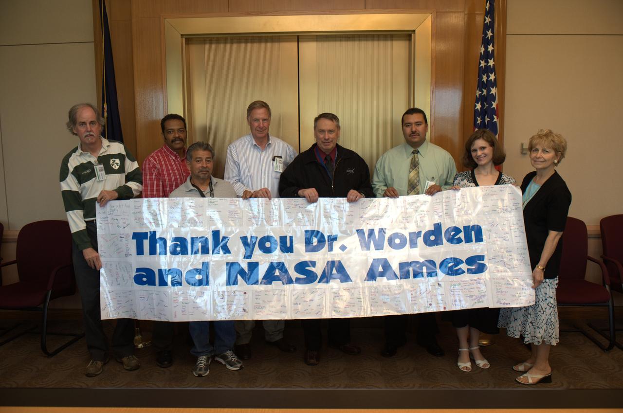 Park Avenue Elementary Teachers Visit / Thank You for Donation of Computers. From left to right are Dennis Wingo, Skycorp, Damon Reid, Property Disposal Officer NASA Ames, Andy Dominguez, Property Disposal Specialist NASA Ames, Kenneth Zin, PKZ Corp. Pete Worden, Director, NASA Ames Research Center, Sergio Torres, Vice Principle Park Avenue Elementary,  unkown, Betty Maxwell, Speech Languare Pathologist.