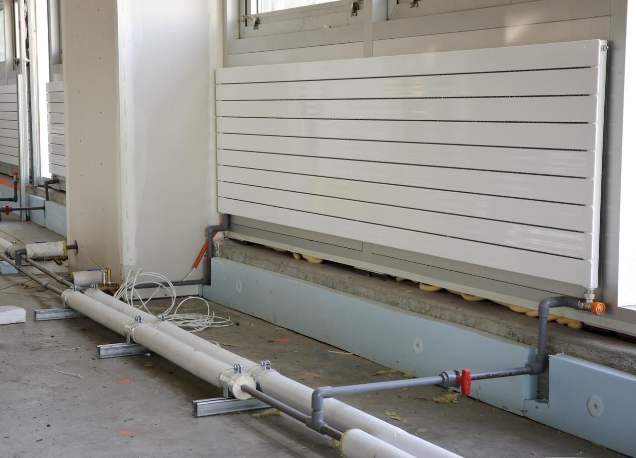 Construction of the new NASA Ames Green Building dubbed Sustainability Base located on the Ames Research Center campus at Moffett Field, CA. heating panels on walls under windows
