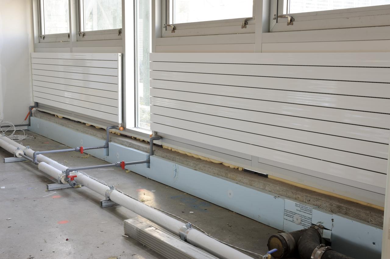 Construction of the new NASA Ames Green Building dubbed Sustainability Base located on the Ames Research Center campus at Moffett Field, CA. heating panels on walls under windows