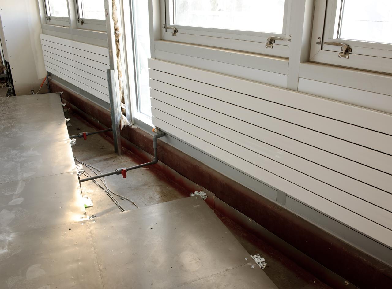 Construction of the new NASA Ames Green Building dubbed Sustainability Base located on the Ames Research Center campus at Moffett Field, CA. Raised floors for heating from beneath.