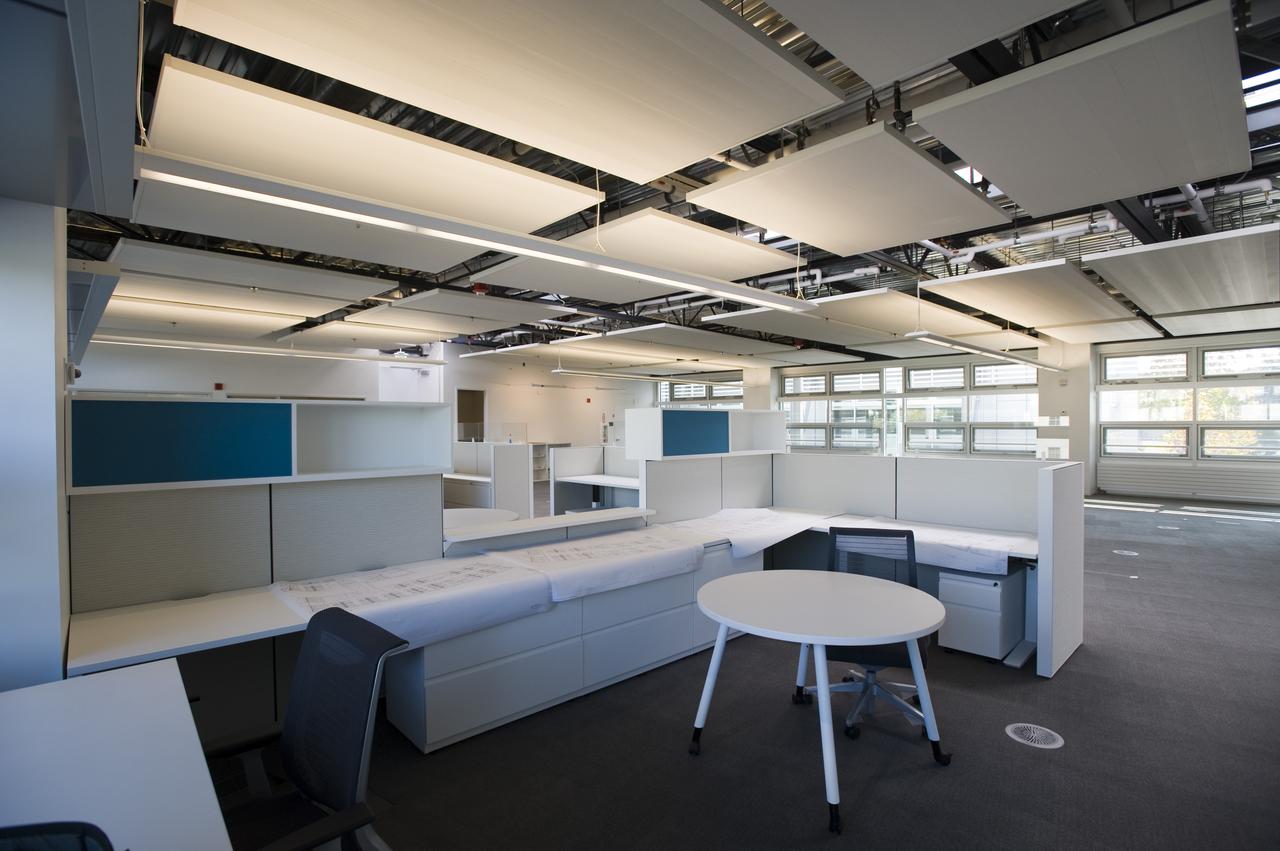Construction of the new NASA Ames Green Building dubbed Sustainability Base located on the Ames Research Center campus at Moffett Field, CA. interior view as cubicles are being set up and open spaces arranged.