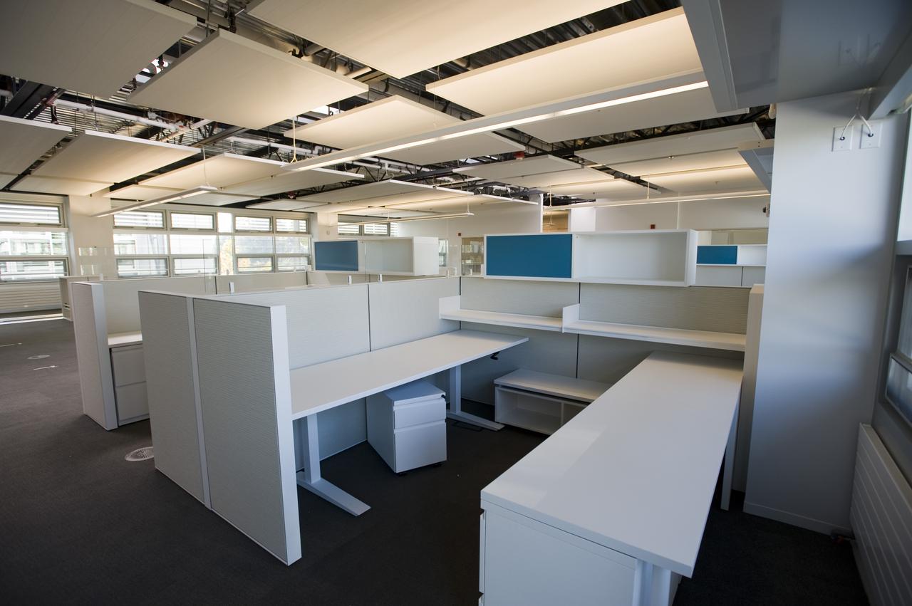 Construction of the new NASA Ames Green Building dubbed Sustainability Base located on the Ames Research Center campus at Moffett Field, CA. interior view as cubicles are being set up and open spaces arranged.