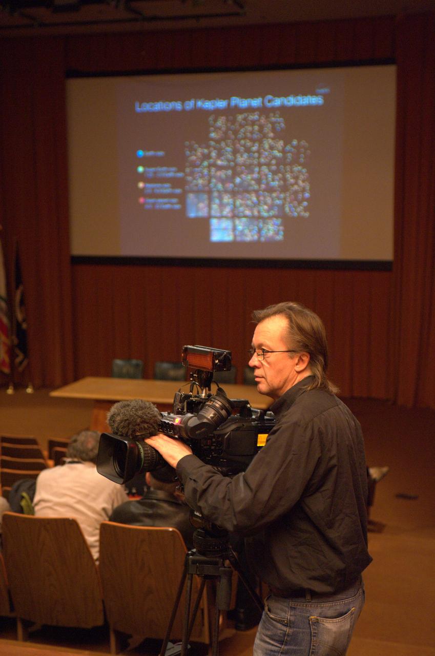 Kepler team members at press event and doing media interviews.