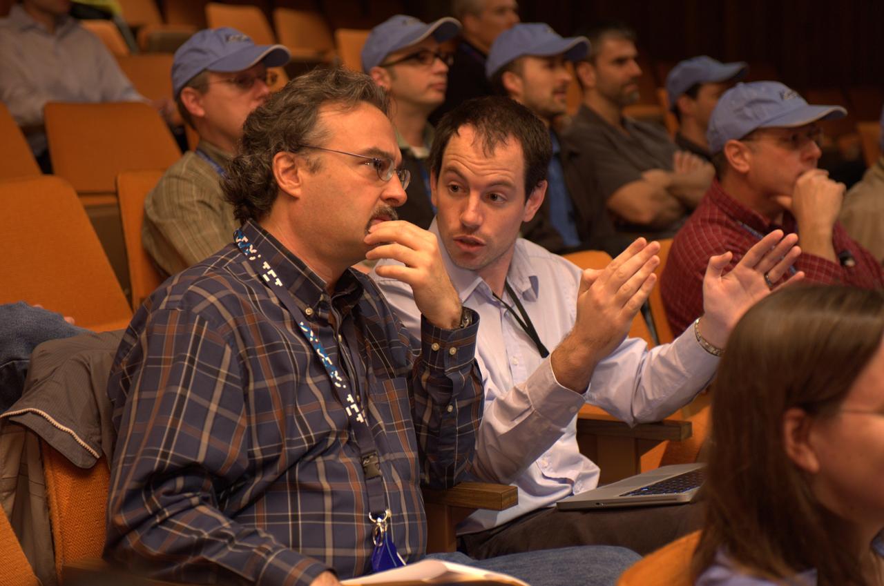 Kepler team members at press event and doing media interviews.