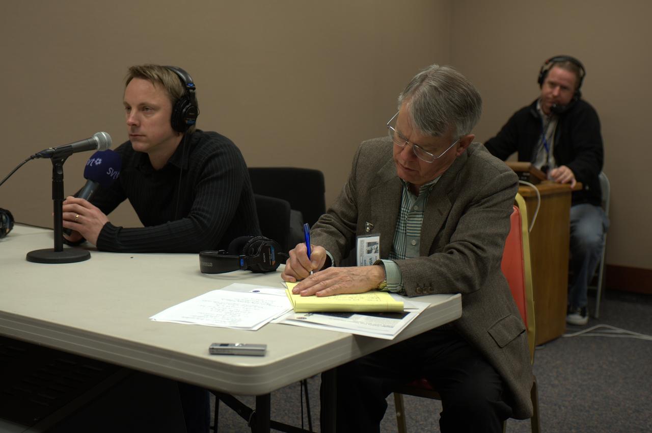 Kepler team members at press event and doing media interviews.