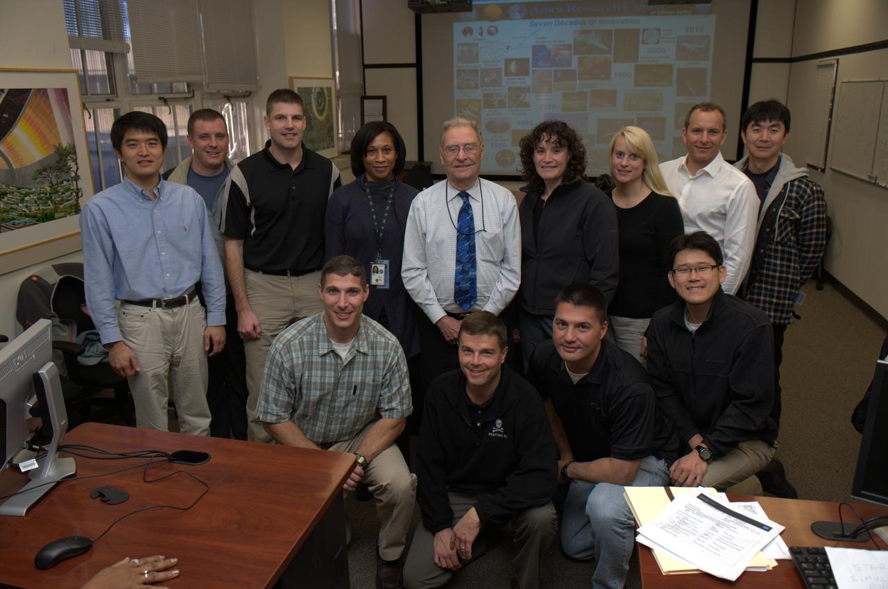 The 14 member 2009 class of NASA astronauts, Japan Aerospace Explortion Agency (JAXA) astronauts and Canadian Space Agency astronauts visit  Ames Research Center.  From left to right back row are Takuya Onishi (JAXA), Scott Tingle, Jeremy Hansen, Jeanette Epps, Jack Boyd (Ames), Serena Aunon, Kathleen (Kate) Rubins, David Saint-Jacques (CSA) Kimiya Yui (JAXA), Michael Hopkins, Gregory (Reid) Wiseman, Kjell Lundgren, Norishige Kanai (JAXA).