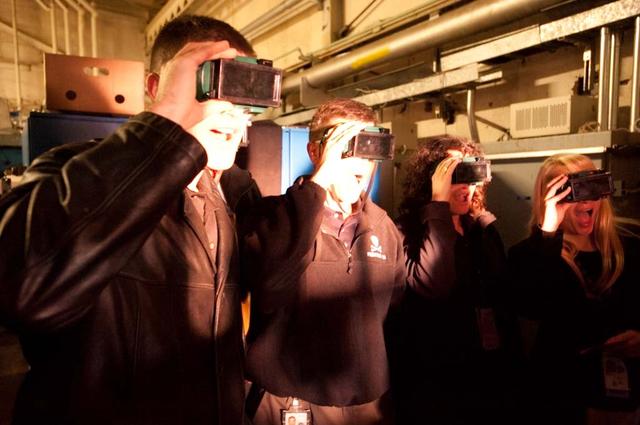 The 14 member 2009 class of NASA astronauts, Japan Aerospace Explortion Agency (JAXA) astronauts and Canadian Space Agency astronauts visit the Arc Jet Facilities at Ames Research Center.  Jeremy Hansen, Gregory 'Reid' Wiseman, Serna Aunon, Kathleen (Kate) Rubins watch the test artical burn durning a test run.