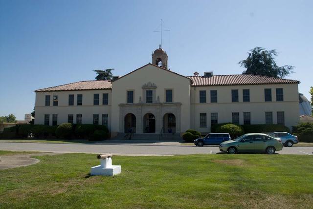 NASA Research Park (NRP) shenandoah Plaza Historic Buildings at Moffett Federal Airfield, CA B-17 (wi/cannon on grassy area of parade ground) taken by Photo summer student Sohan