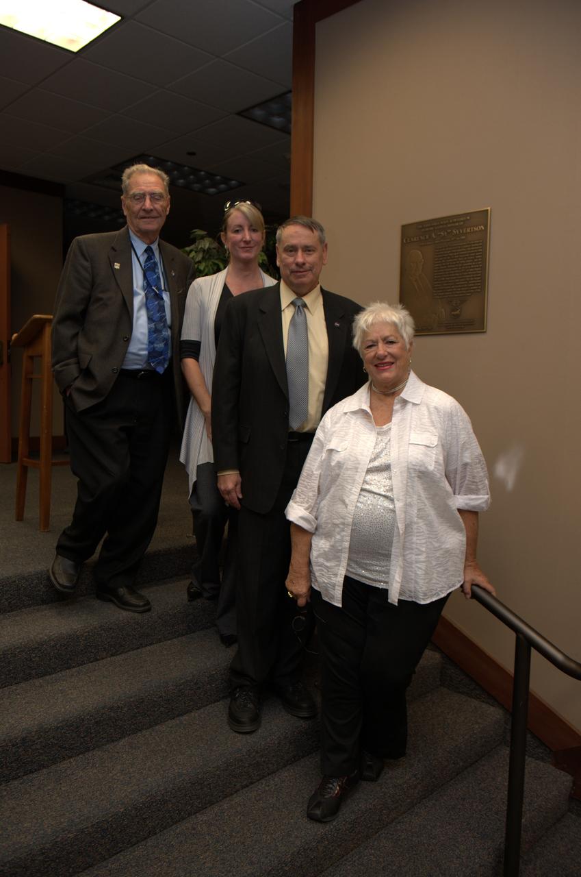 Dedication of the Clarence A. 'Sy' Syvertson Auditorium On July 15, 2011, Ames officiclly renamed its Main Aduitorium (N201) in memory of former Ames Center Director Clarence 'Sy' Syvertson. Syvertson served as Ames Center Director from 1977 to 1984 and passed away Sept 13, 2010. He began his 35-year career at Ames in 1948 and in addition to being Center Director, he also served as Ames' Director of Astronautics and Deputy Director. Syvertson was instrumental in remodeling the auditorium and it is entirely fitting that it be named in his honor. Seen here from left to right are: Syvertson's wife Joann; Ames Center Director S. Pete Worden ; his daughter Lynn and Jack Boyd, senior advisor to the center director.