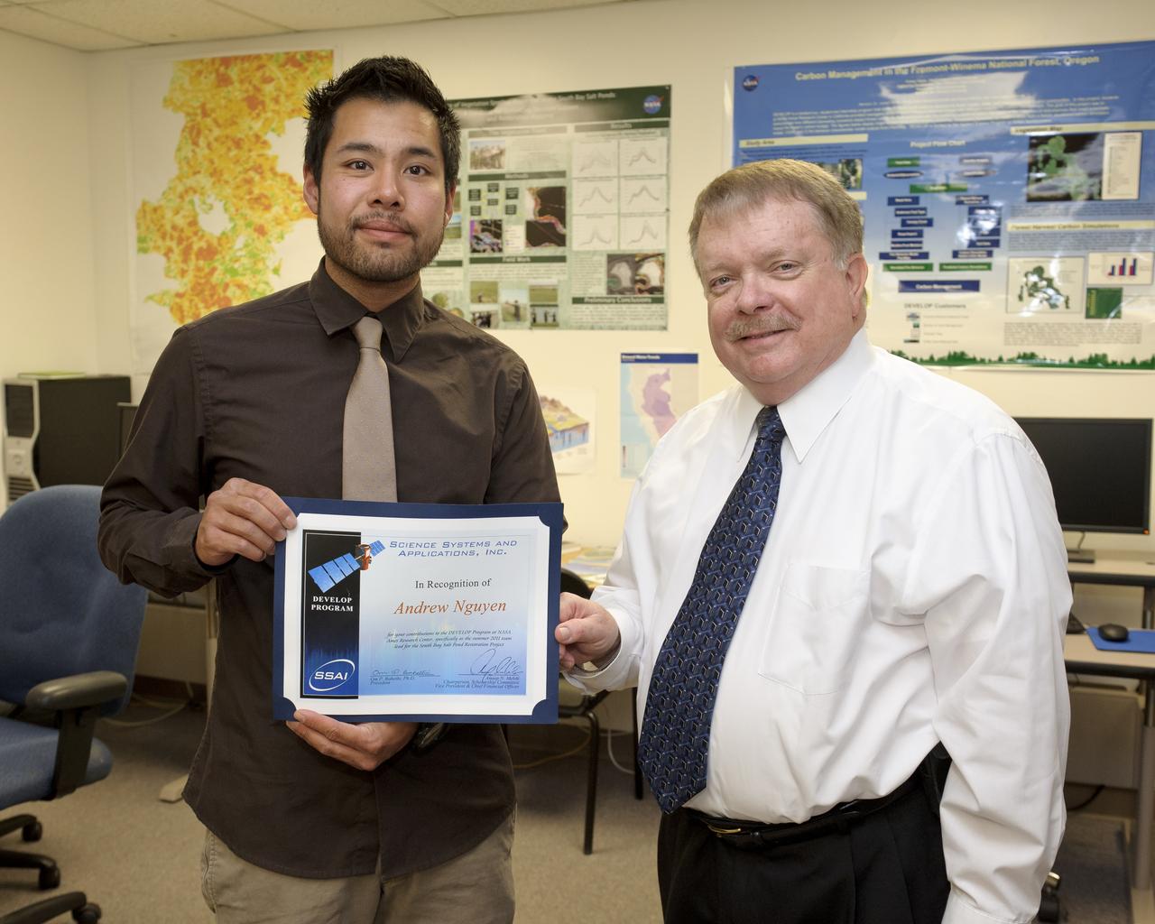 Science Systems and Applicatins, Inc. Scholarship presented to DEVELOP intern Andrew Nguyen by Jay Skiles