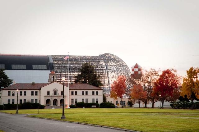 Lunar Science Institute, Bldg-17 at NASA Research Park in the fall with Hangar One deskinning project going on in backbround.