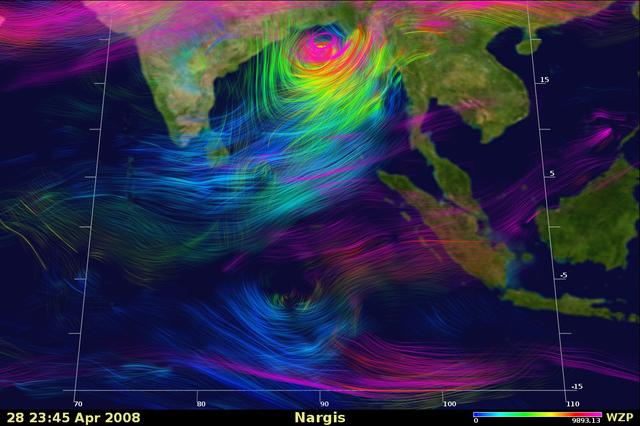 Shen_Nargis: Snapshot of a very large simulation showing the altitude and velocity of wind speeds within the 2008 Cyclone Nargis. Top wind speeds for the storm were measured at 135 mph. The lowest altitude winds are shown in blue, while the highest altitude winds are shown in pink. Wind speed is shown by color density: higher density denotes stronger winds, slightly transparent color indicates slower wind speeds.  Credit: Bryan Green, NASA Ames Research Center; Bo-wen Shen, NASA Goddard Space Flight Center.