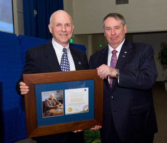Ames 2012 Fellows Awards Dinner Honoring inductees Lousi J. Allamandola, Wayne R. Johnson, Baruch S. Blumberg and Hans Mark. Dr. Carl Pilcher accepting for Dr. Baruch Blumburg with Pete Worden, Ames Director presenting.