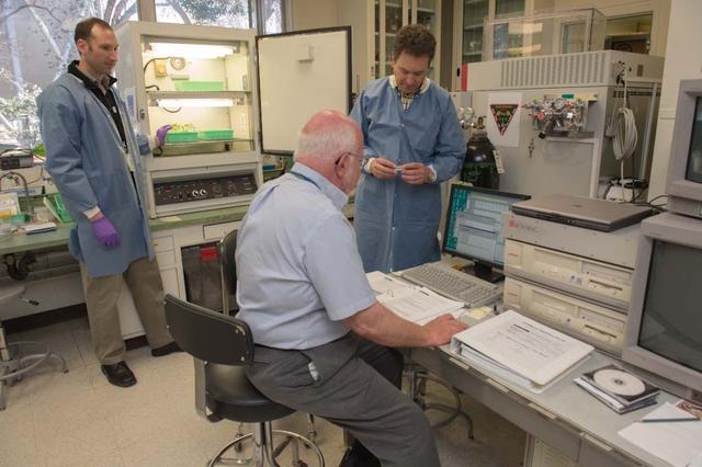 TROPI Seed Growth-1 payload (will fly to ISS on Space X 2) from left to right are Krisofer Vogelsong, Project Science Lead, Tropi SG-1, Lockheed Martin, NASA Ames, John Freeman Plant Scientist, Tropi SG-1, intrinsyx, NASA Ames, seated Dave Heathcote, ISS Payload Support, Lockheed Martin, NASA Ames