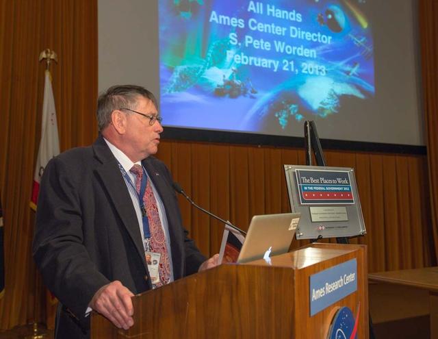 Ames Center Director S. Pete Worden unveils 'Best Places to Work' plaque in Federal Government 2012 at all-hands meeting