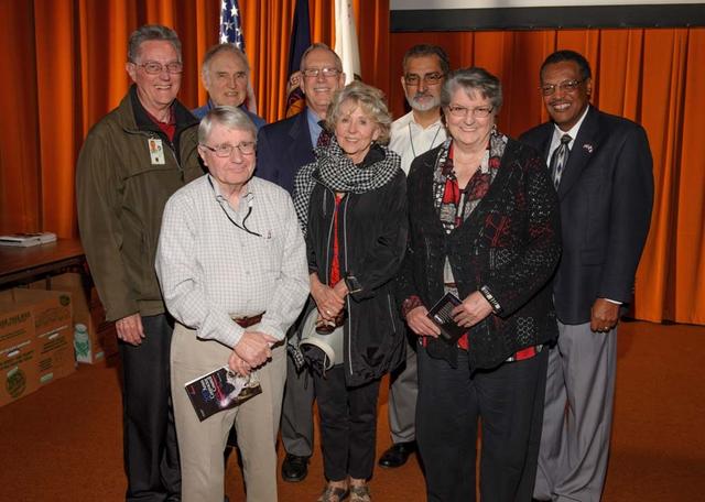 Ames Contractor Council Excellence Awards : Ames Deputy Center Director Lewis Braxton (right) congratulates contractor staff in attendance with 40 or more years of service to NASA Ames: Back row, left to right: Doug Pearson (55), Fred Witteborn (54), Herbert Finger (42) and Rick Serrano (47). Front row, left to right: John Humbert (49), Vera Vizir (40) and Lynn Albaugh (40).