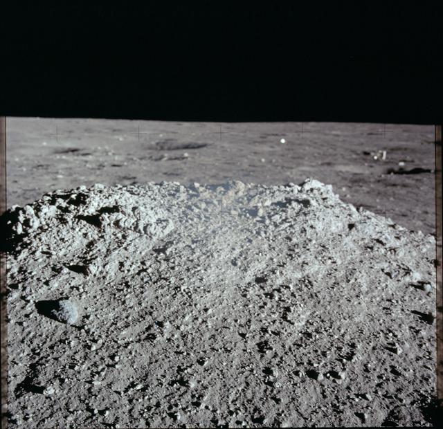 NASA image: Apollo 12 Mission image - View of lunar surface mound 