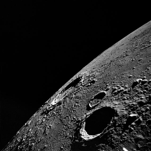 NASA image: Apollo 12 Mission image - High oblique view of crater Copernicus and Carpathian Mt. range 