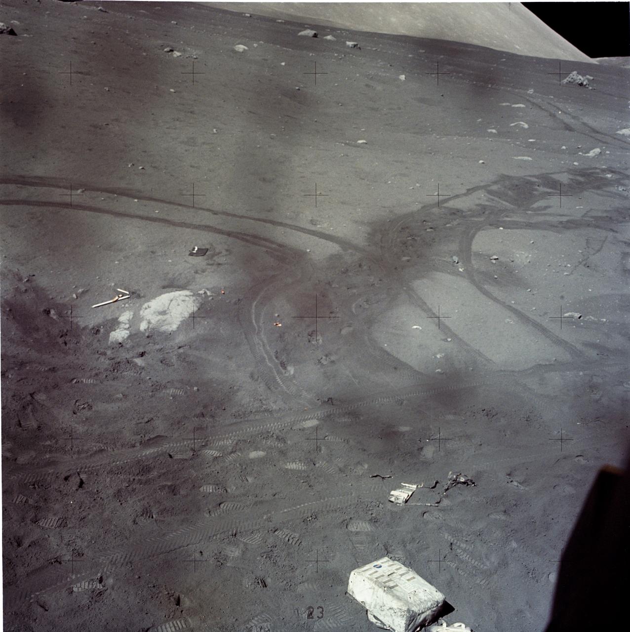 AS17-145-22196 (7-19 Dec. 1972) --- Astronaut Harrison H. Schmitt's discarded Portable Life Support System (PLSS), along with tracks from the Lunar Roving Vehicle (LRV) and boot prints were photographed through the Lunar Module (LM) window late in the mission. While astronauts Eugene A. Cernan, commander, and Schmitt, lunar module pilot, descended in the LM "Challenger" to explore the Taurus-Littrow region of the moon, astronaut Ronald E. Evans, command module pilot, remained with the Command and Service Modules (CSM) "America" in lunar orbit.