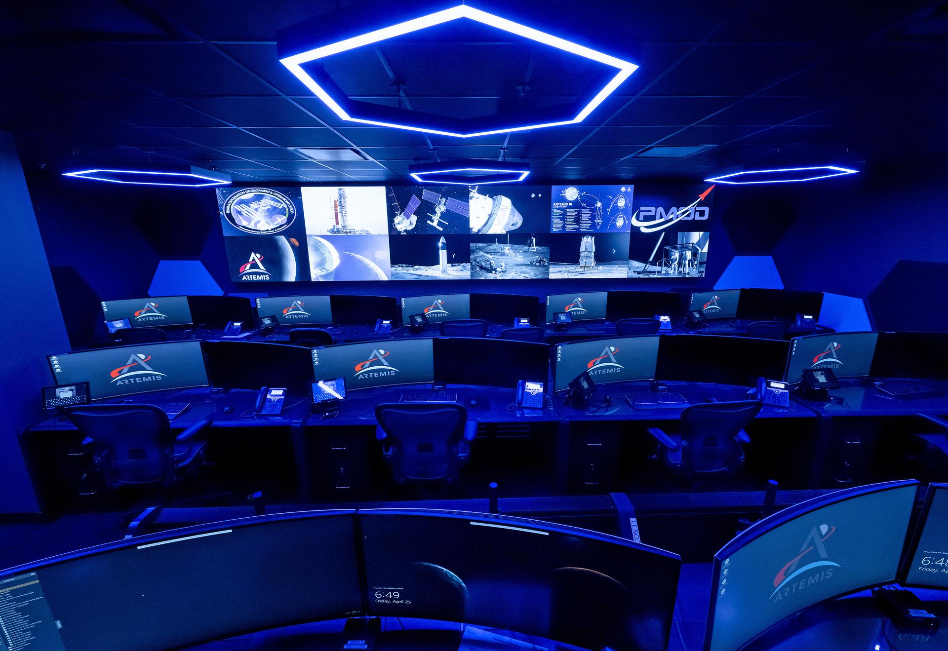 These photos offer a look inside the twin control rooms at NASA’s Marshall Space Flight Center in Huntsville, Alabama, where engineers will monitor Artemis science and future landing operations for Artemis. The LUCA (Lunar Utilization Control Area) and LESA (Lander Engineering Support Area) rooms are part of the Huntsville Operations Support Center at NASA Marshall. The LUCA is specially designed to support a wide variety of science operations on and around the Moon – and beyond. Engineers in the LUCA monitored operations for the Lunar Node-1 experiment, an autonomous navigation payload that was part of the first NASA Commercial Lunar Payload Services (CLPS) launch on Intuitive Machines’ Nova-C lunar lander in 2024. NASA Marshall flight controllers will use the LUCA again for Artemis II to monitor science operations.  Beginning with Artemis III, members of the NASA Human Landing System Mission Insight Support Team – a group of engineers, safety leads, flight operations experts, and technical authorities – will work in the LESA. There, they will monitor lander systems in real-time and be involved in key decision-making processes throughout the mission.   For more information, contact NASA Marshall’s Office of Communications at 256-544-0034.